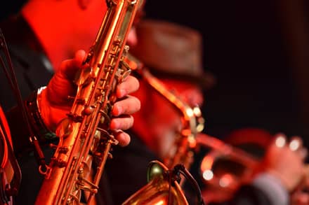Musicians performing on stage at a venue