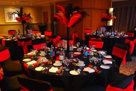 Function room setup for a Christmas party at a Hilton hotel