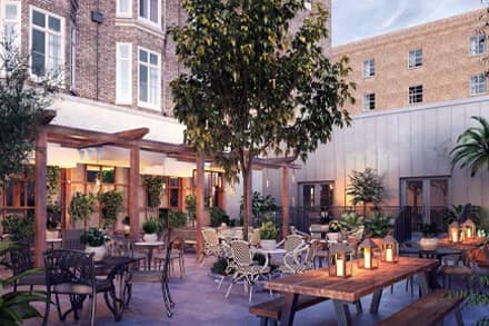 Courtyard terrace area setup for a evening summer party at the Grand