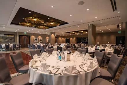 Function room setup for a dinner and dance at a DoubleTree by Hilton hotel
