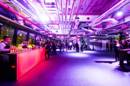 Guests attending a drinks reception at a brand launch