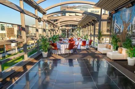 Rooftop terrace summer party with dancefloor at a DoubleTree by Hilton hotel