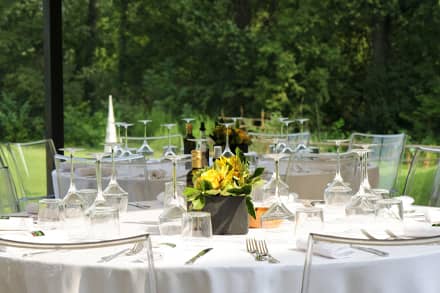 Table settings with flowers for an outdoor summer party