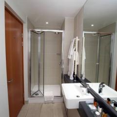 Standard Bedroom Bathroom Photo