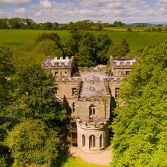 Clearwell Castle secluded by trees Photo
