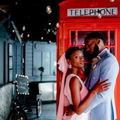 City Lovers Couple by red Phone Box Photo