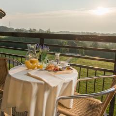 Breakfast on the balcony overlooking golf courses Photo