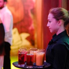 Waitress serving drinks Photo