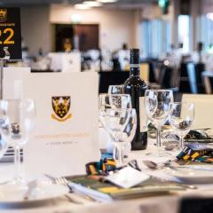 Champions Suite Table Settings Photo