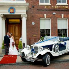 Bride and Groom Outside The Alexander Centre