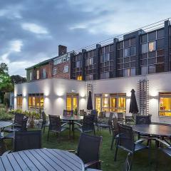 Hotel Exterior with Garden