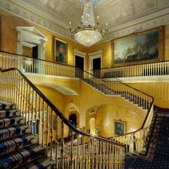 The grand staircase with chandelier.